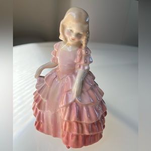 Vintage Royal Doultan “Rose” figurine.